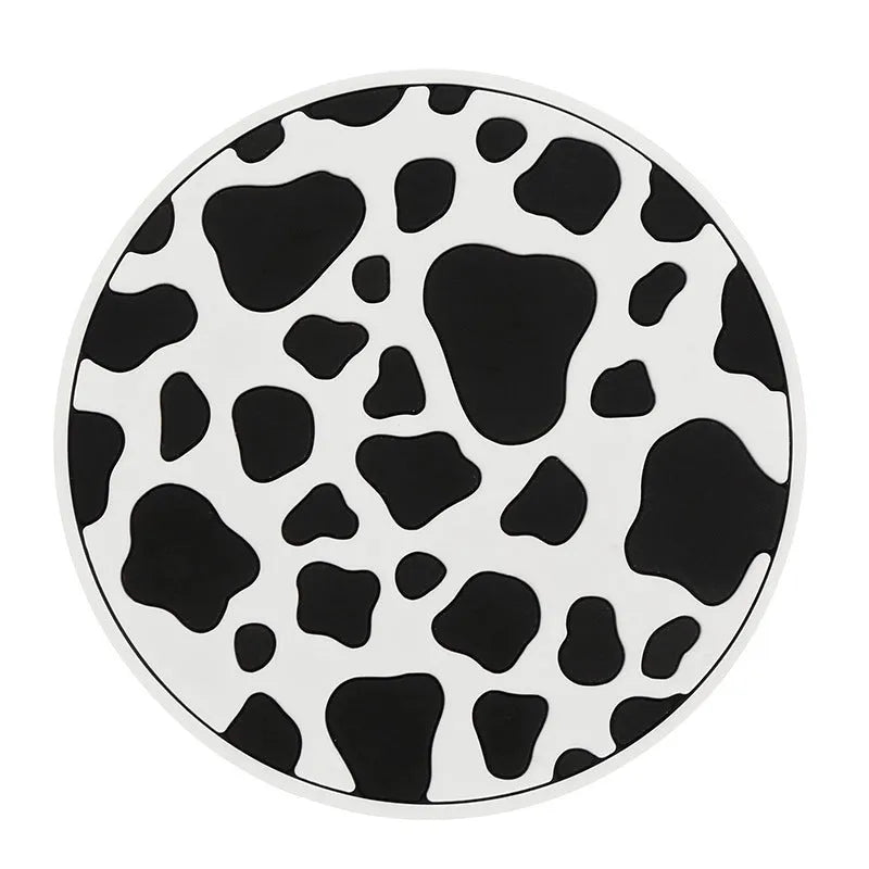 Black and white checkerboard PVC car cup mat inserted into a car door card slot.