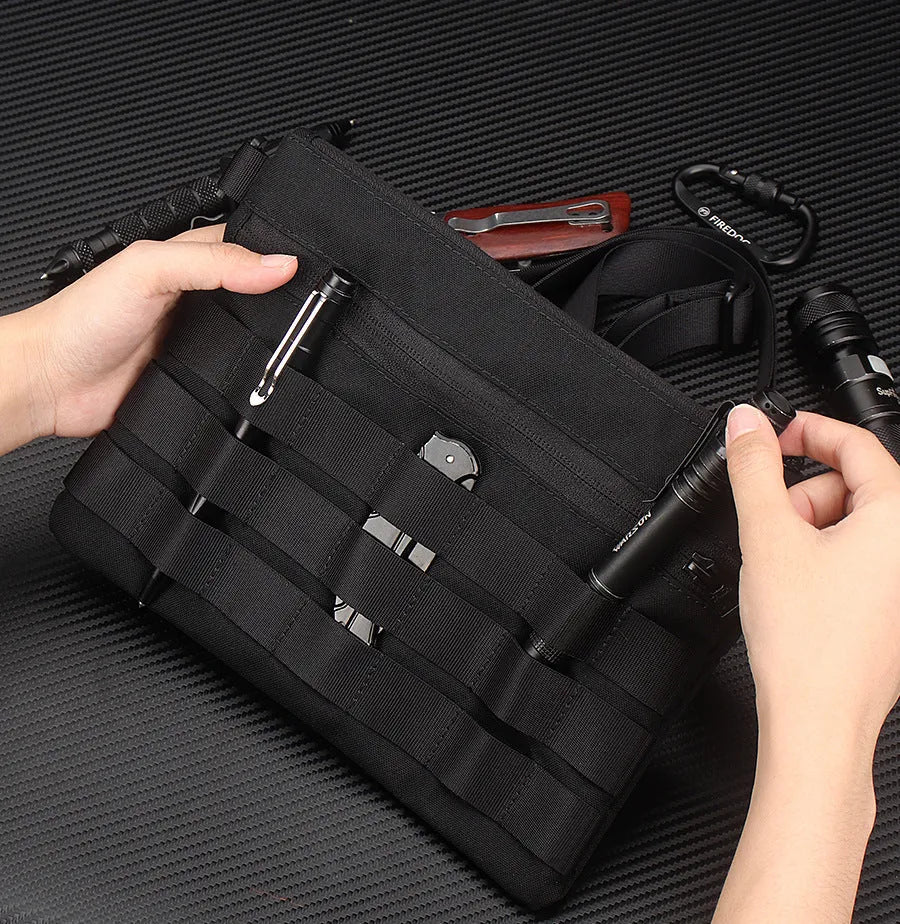 Black Oxford cloth tactical outdoor pouch measuring 18 by 3.5 centimetres