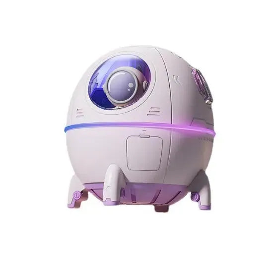 Light purple astronaut-themed USB humidifier with colourful LED lights on desktop