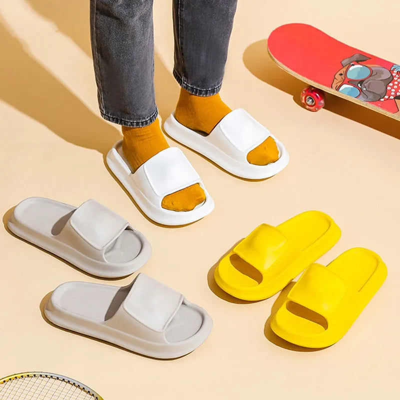 Soft EVA flip-flop slippers with thick sole in multiple colours on a white background.