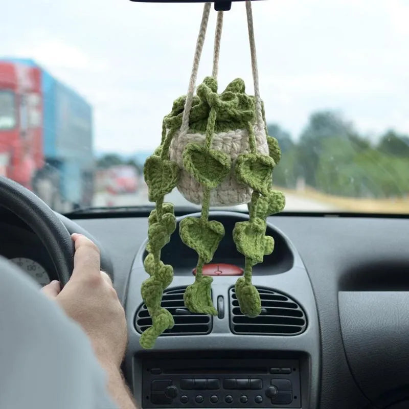 Green and white knitted rope car plant ornament with 8cm base and hanging rope.