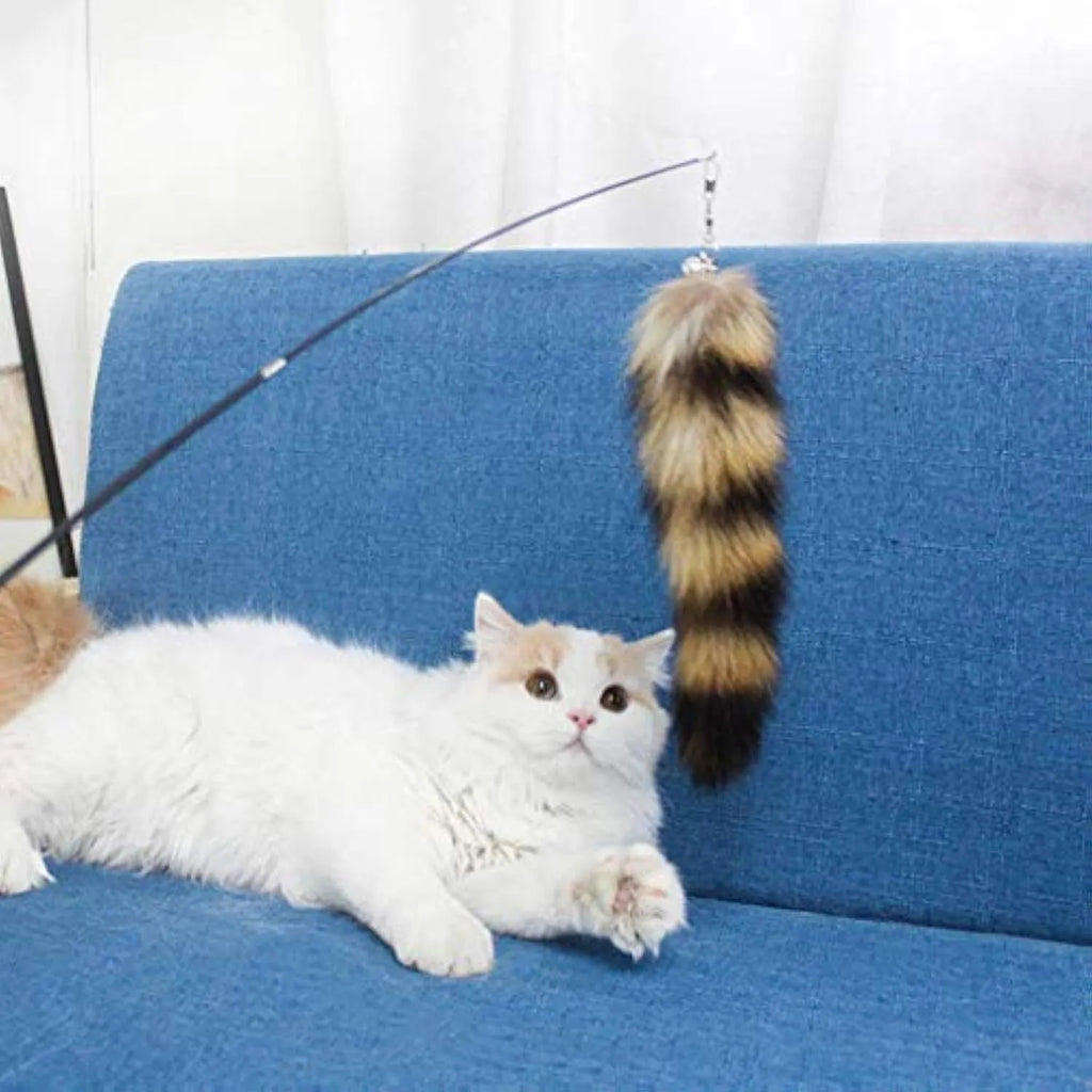 Black cat toy wand with feather teaser on elastic string measuring 42cm