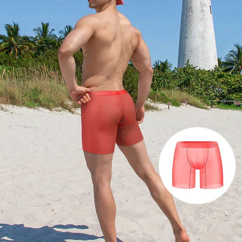 Men's low waist boxer shorts in solid orange, pink, or red ice silk nylon fabric.