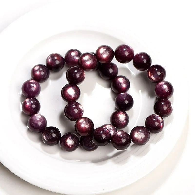 Purple lepidolite crystal bracelet with polished round beads in geometric design