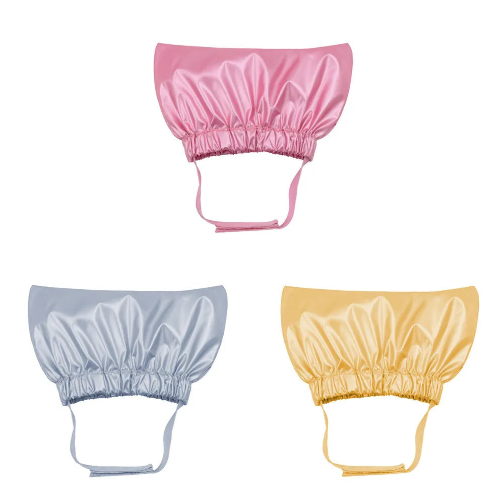Adjustable pet shower cap for dogs and cats in waterproof non-woven fabric with three colour options