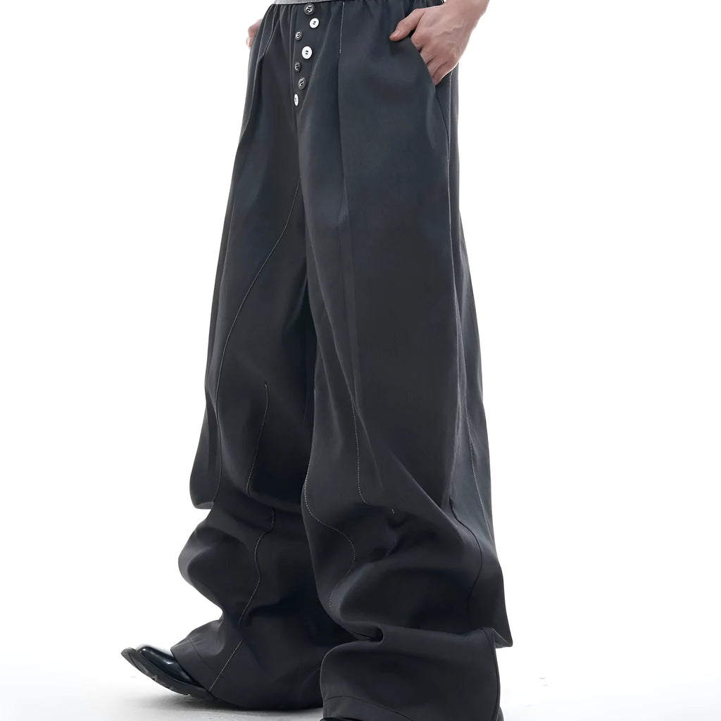 Straight-leg high-waist trousers with button-fly front opening in black or grey