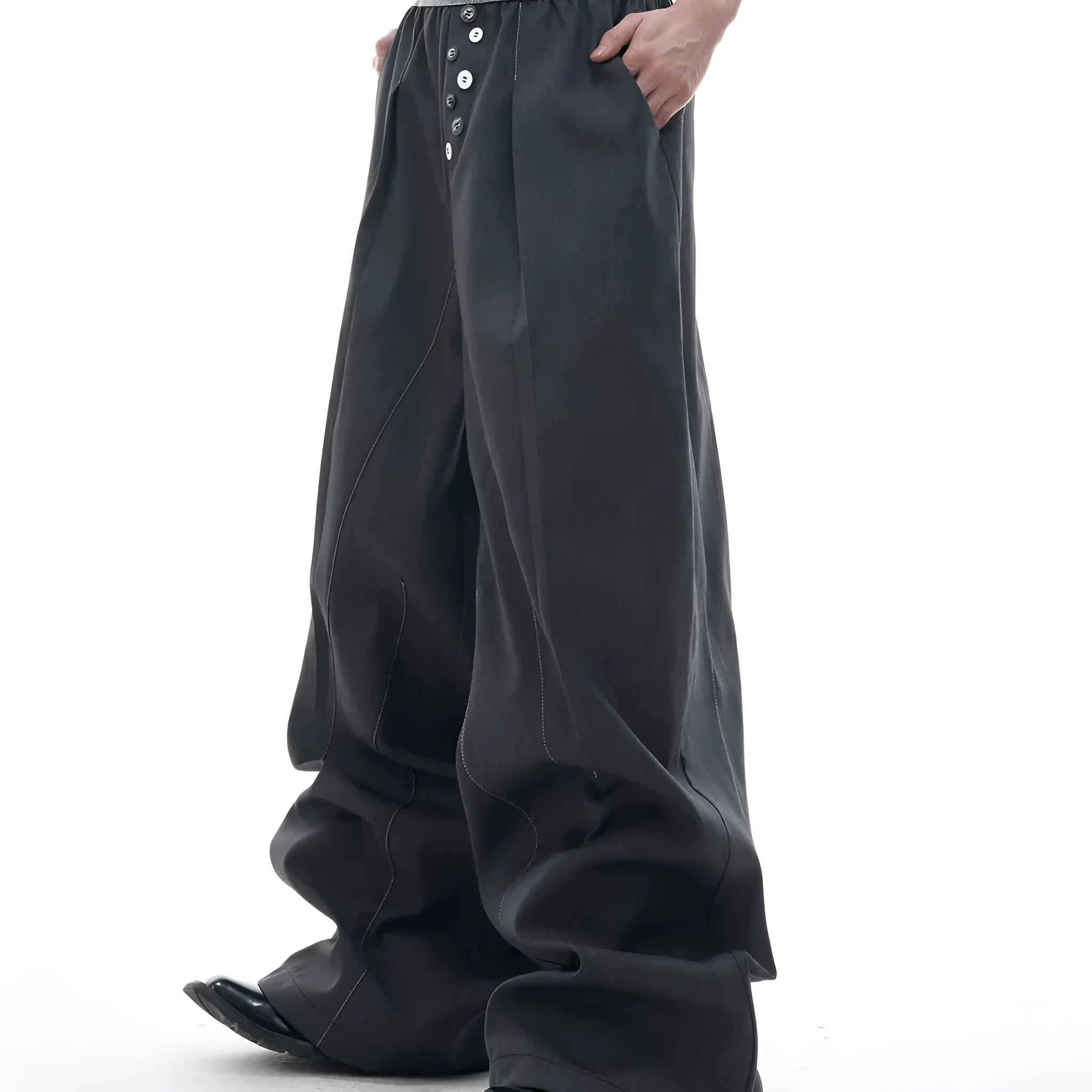 Straight-leg high-waist trousers with button-fly front opening in black or grey