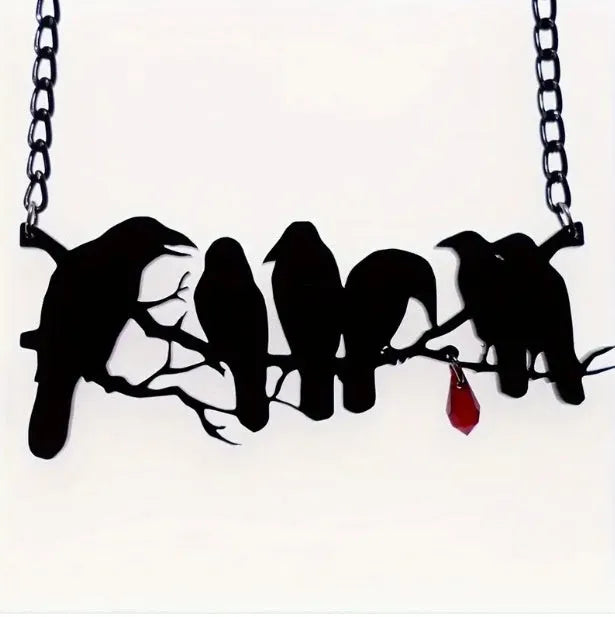 Black gothic style crow bird pendant on a cross chain necklace