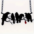 Black gothic style crow bird pendant on a cross chain necklace