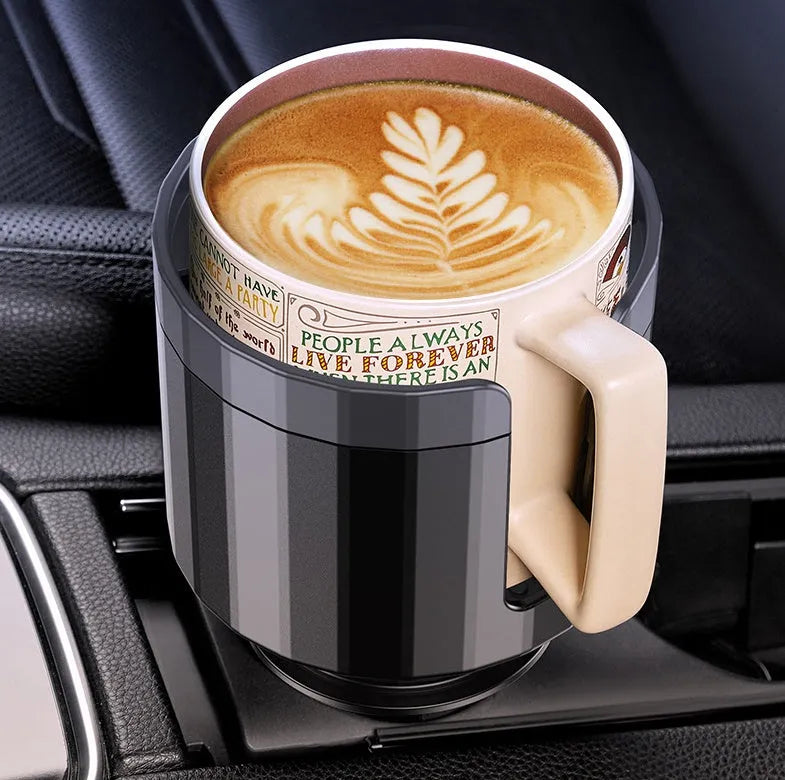 Matte black car cup holder expander with adjustable base for large bottles and cups.