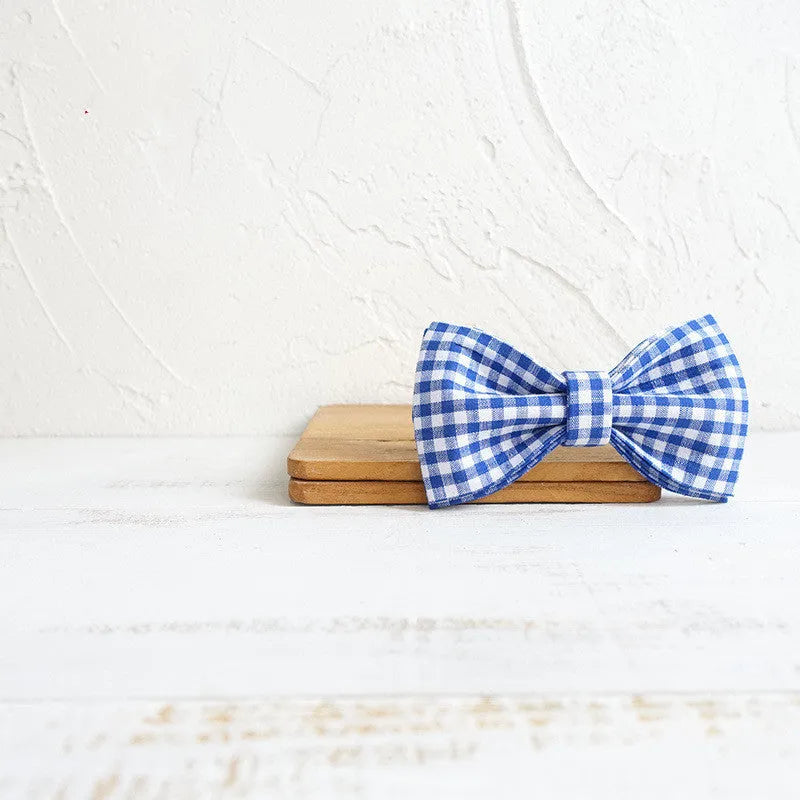 Blue checkered polyester dog bow tie on a collar, XS to XL size options available