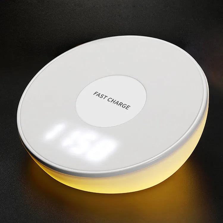 White 10W wireless charging pad with digital clock display and three control buttons.