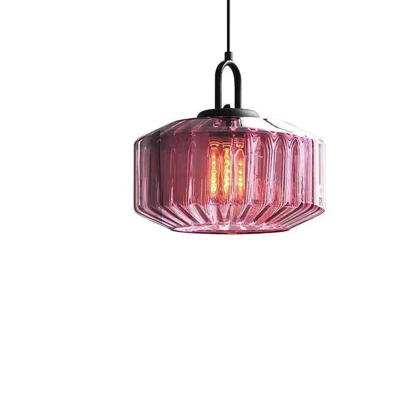 High grade stained glass chandelier in modern simplicity style on ceiling, showing warm light through coloured glass panels