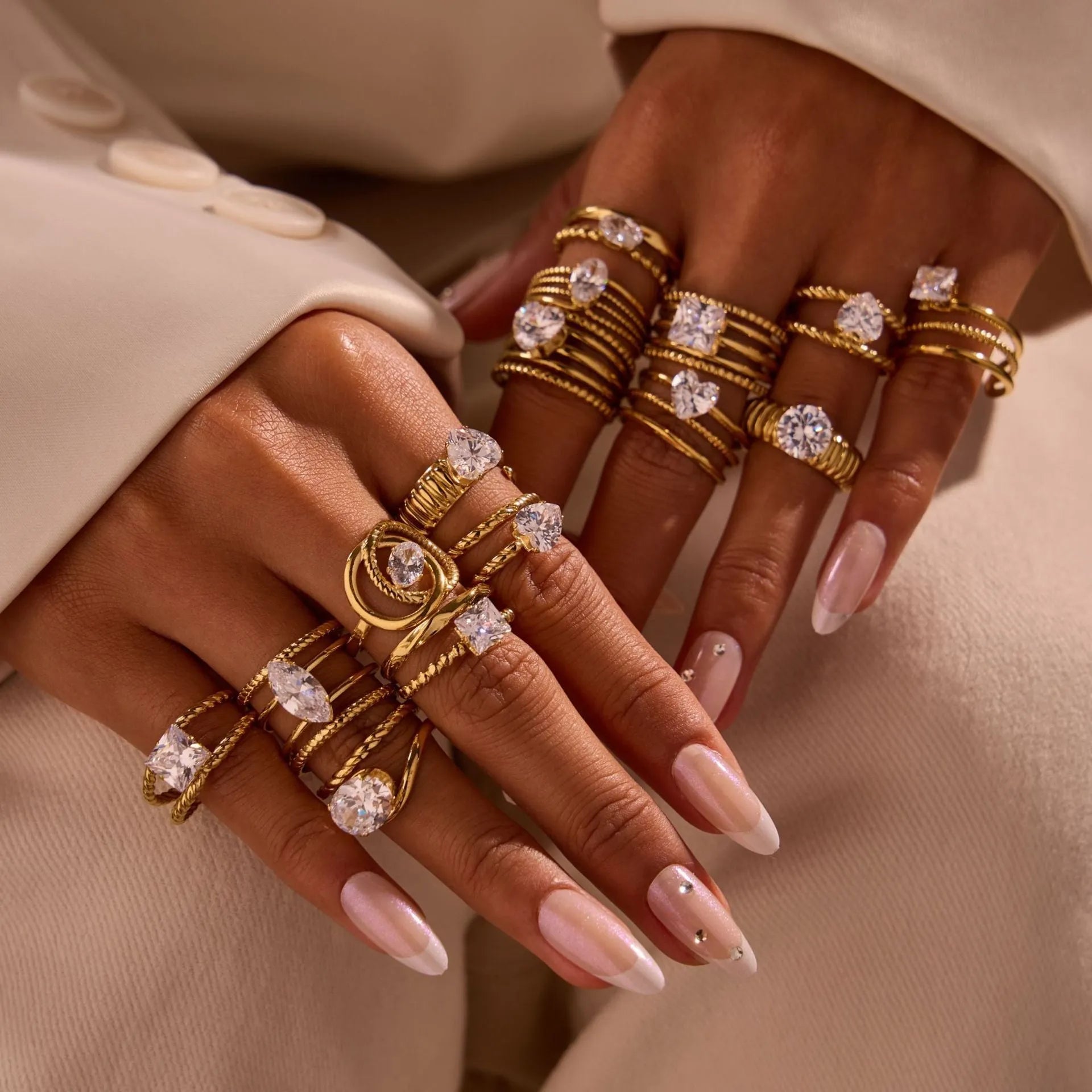 Stainless steel women's ring with gold electroplating and zircon details in geometry design