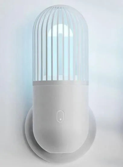 Portable capsule ultraviolet disinfection lamp in black, brown, green or white with dimensions 52x52x136mm