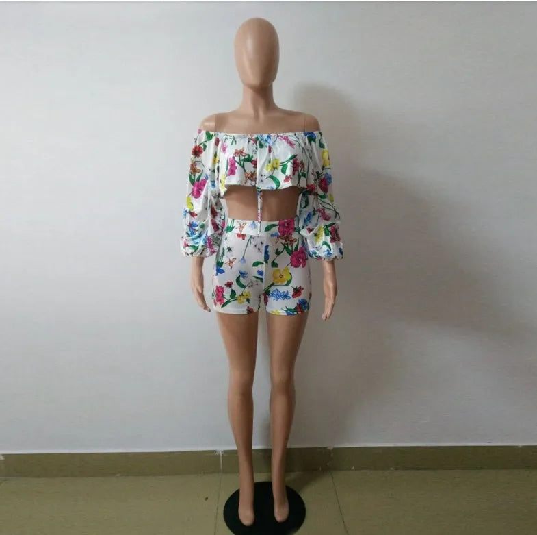 Women's digital print two-piece outfit with pile sleeves on short-sleeve top and matching shorts in multi-colour pattern