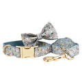 Blue floral pattern dog collar set with matching leash, bow, vest and waste bag dispenser accessories