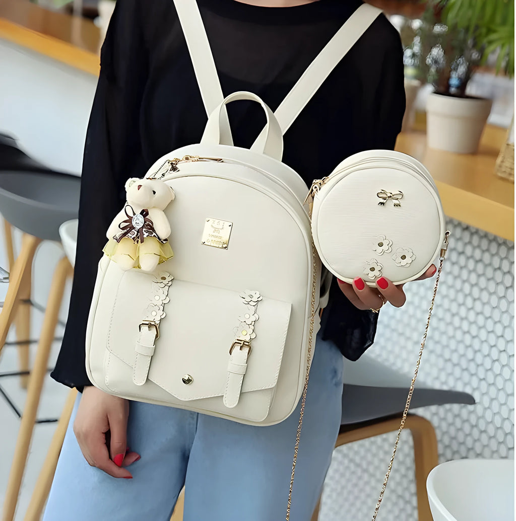 Women's fashion 3-piece bag set including backpack, shoulder bag, and card bag in floral PU leather design