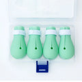 Four green silicone cat anti-scratch foot cover gloves for hand protection during washing and feeding