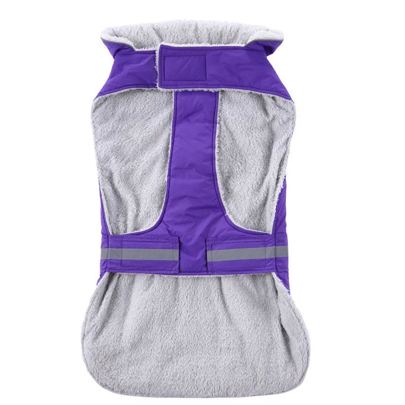 Reflective winter dog coat in pink, with harness holes, lay flat