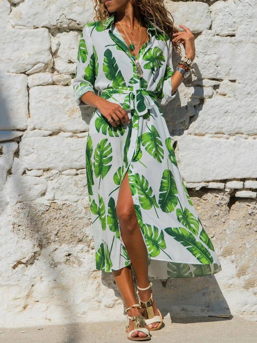 Women's long sleeve V-neck chiffon dress with A-line skirt and printed pattern.