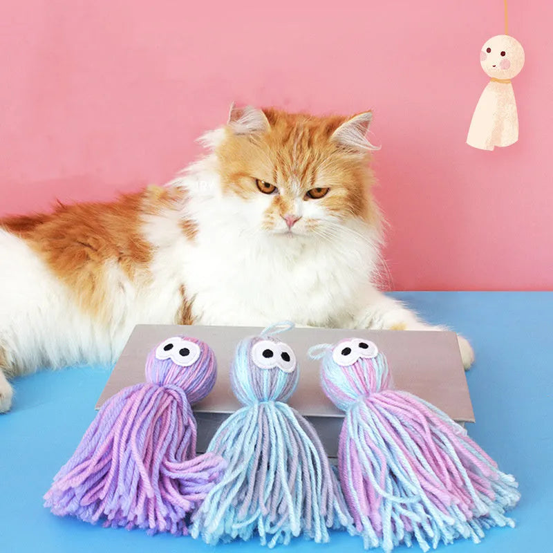 Bite-resistant wool ball cat toy with grinding teeth surfaces and hanging string in blue grey colour