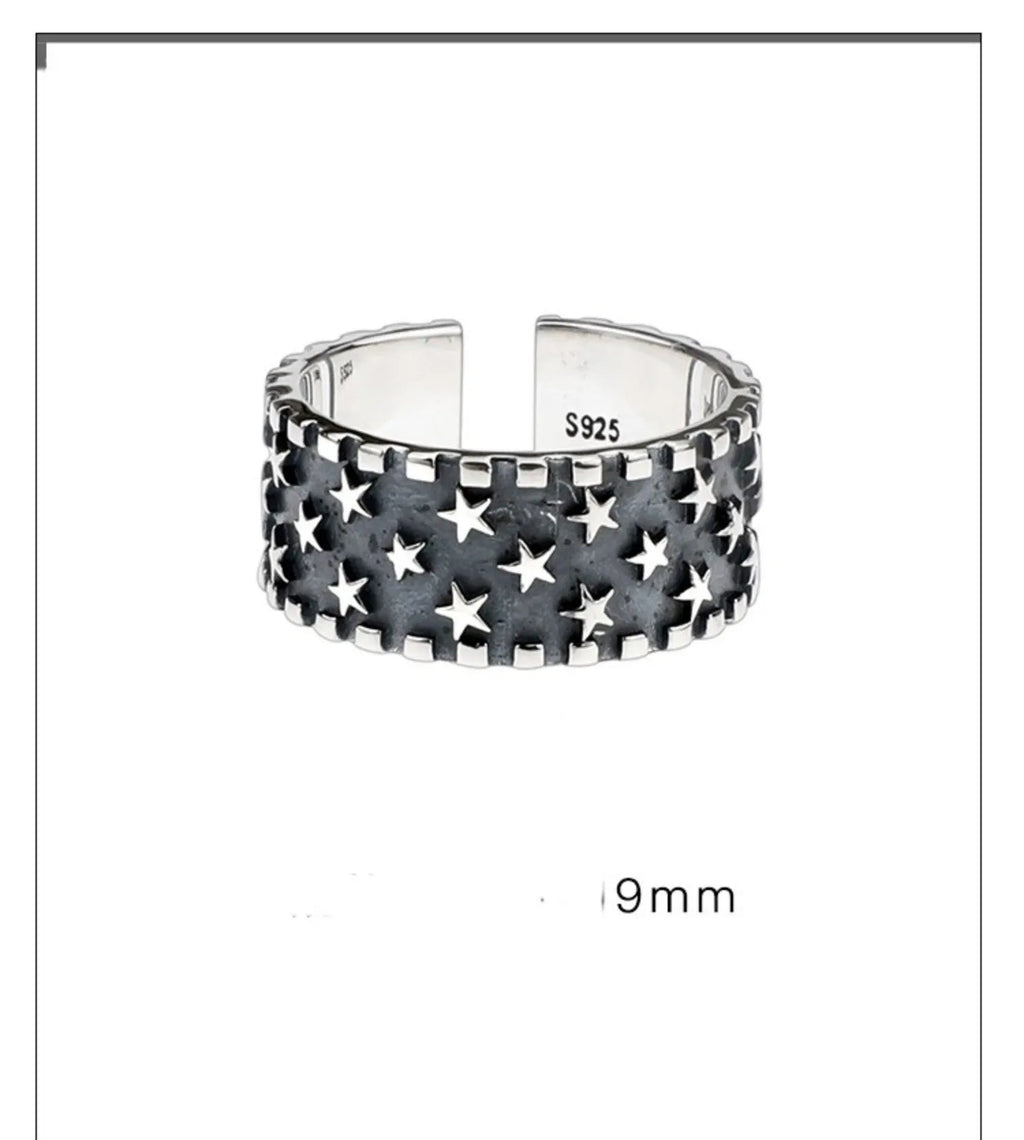 Sterling silver ring with five-pointed star design and adjustable opening