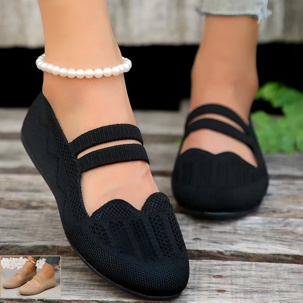 Women's casual mesh slip-on flats in black with round toe, flat heel, and breathable upper