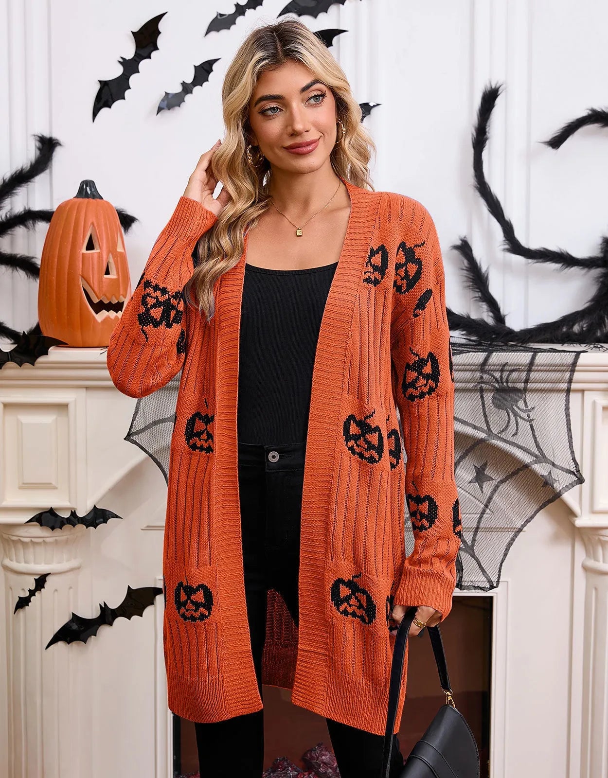 Women's black Halloween cardigan with knitted pumpkin head pattern, straight fit with regular sleeves