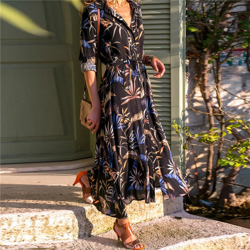 Women's long sleeve V-neck chiffon dress with A-line skirt and printed pattern.