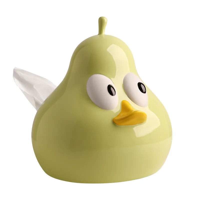 White porcelain pear-shaped tissue box holder in green colour on wooden surface