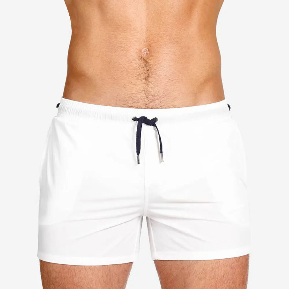 Mesh lining swimming sports shorts in polyester fabric available in six solid colours