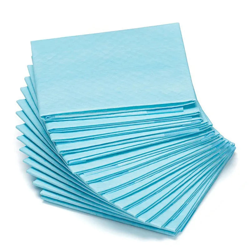 Pack of white pet urinal pads with blue trim, shown alongside a tape measure indicating the 45x60cm M size dimensions.
