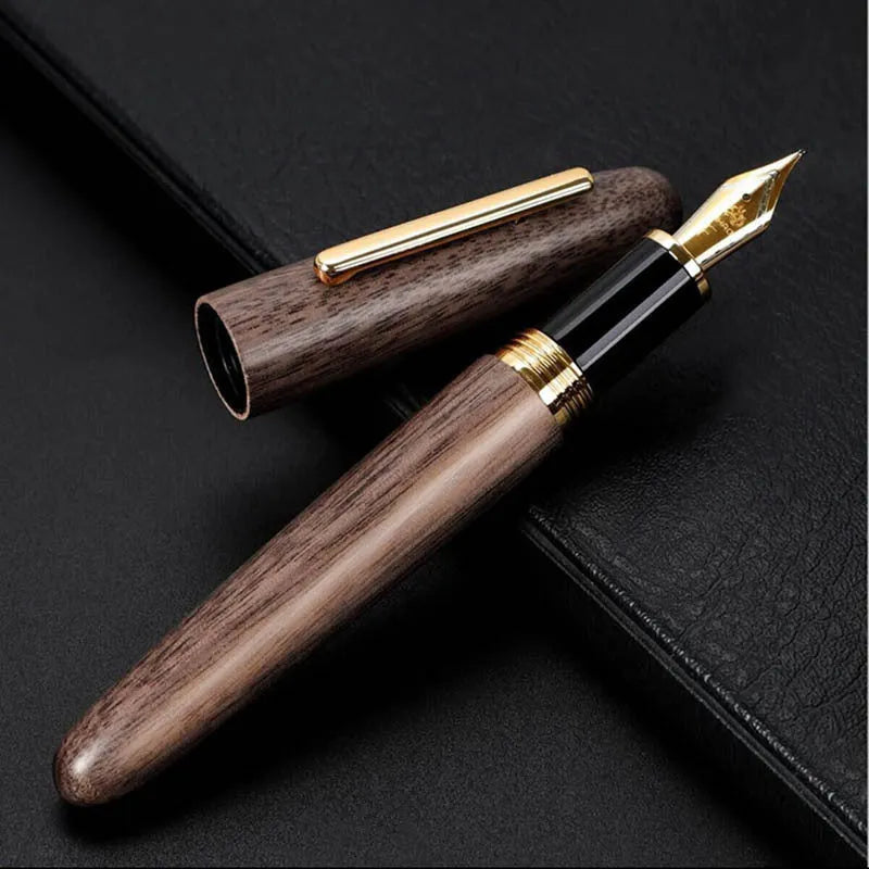Wooden fountain pen with rotating cap showing choice of ebony, rosewood and tiger ebony finishes