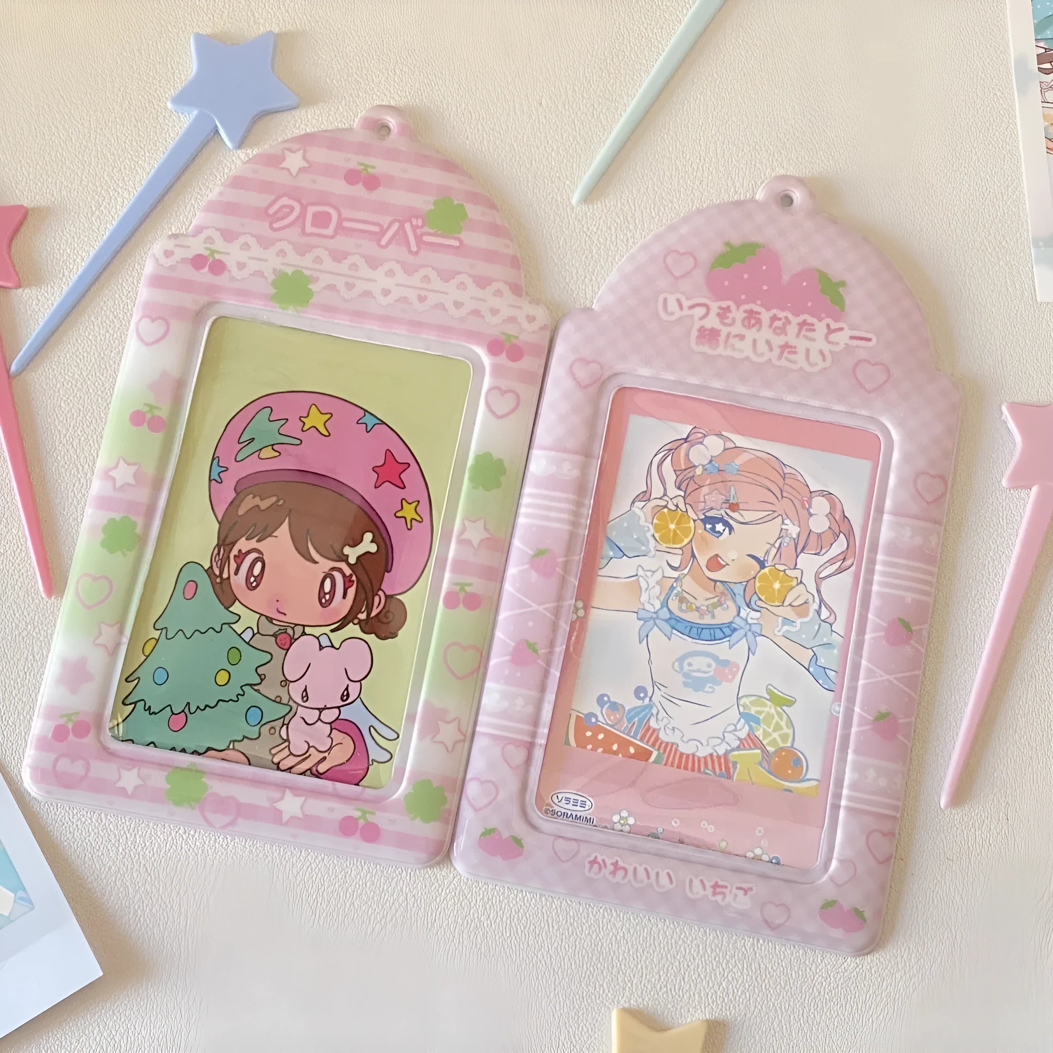 Cartoon strawberry design PVC meal card holder measuring 7.6cm by 13.6cm