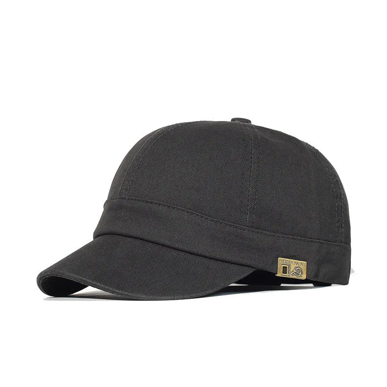 Unstructured cotton dad hat in khaki with short 5.5 cm brim and adjustable strap, front view