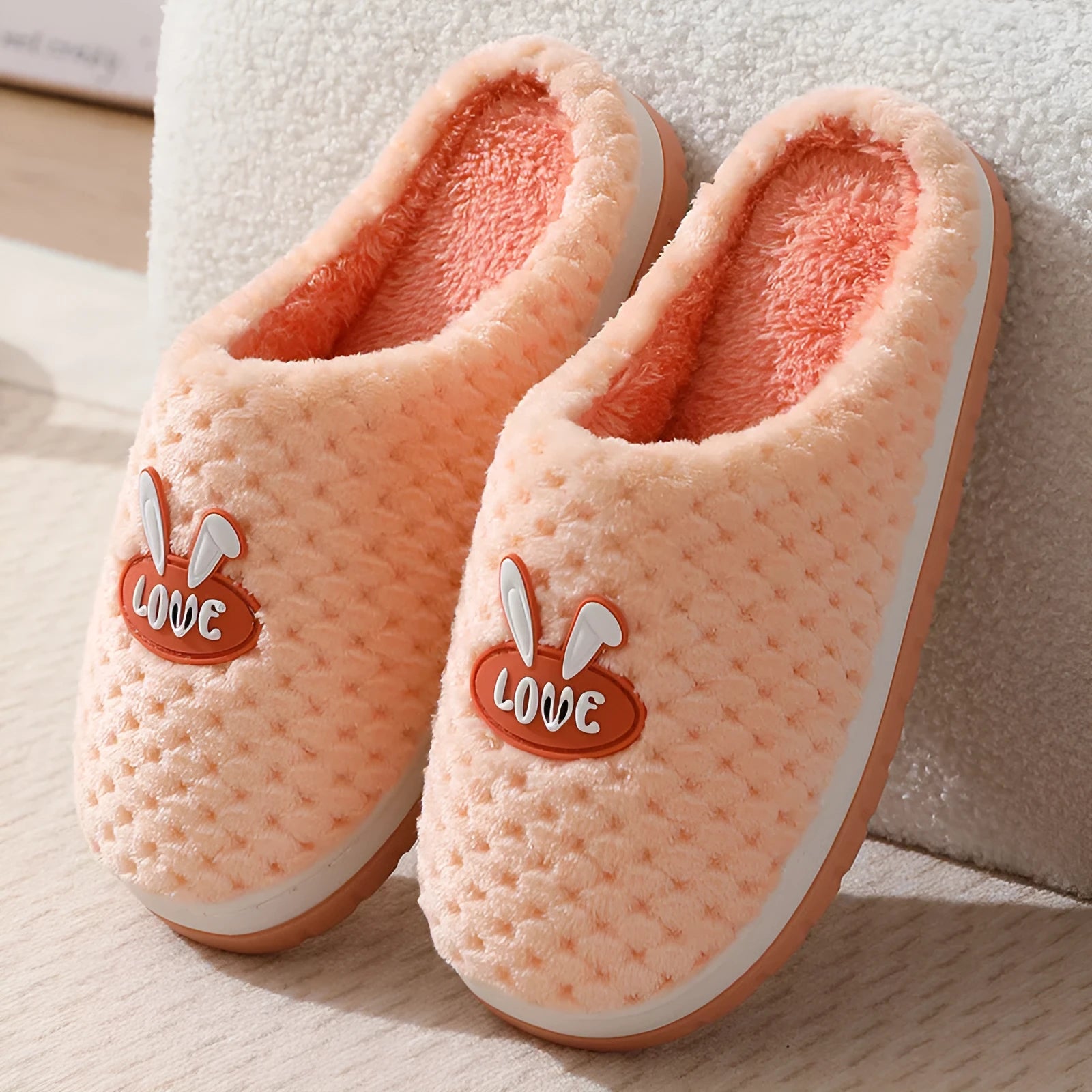 Women's rabbit plaid design winter slippers with thick rubber soles in apricot colour option