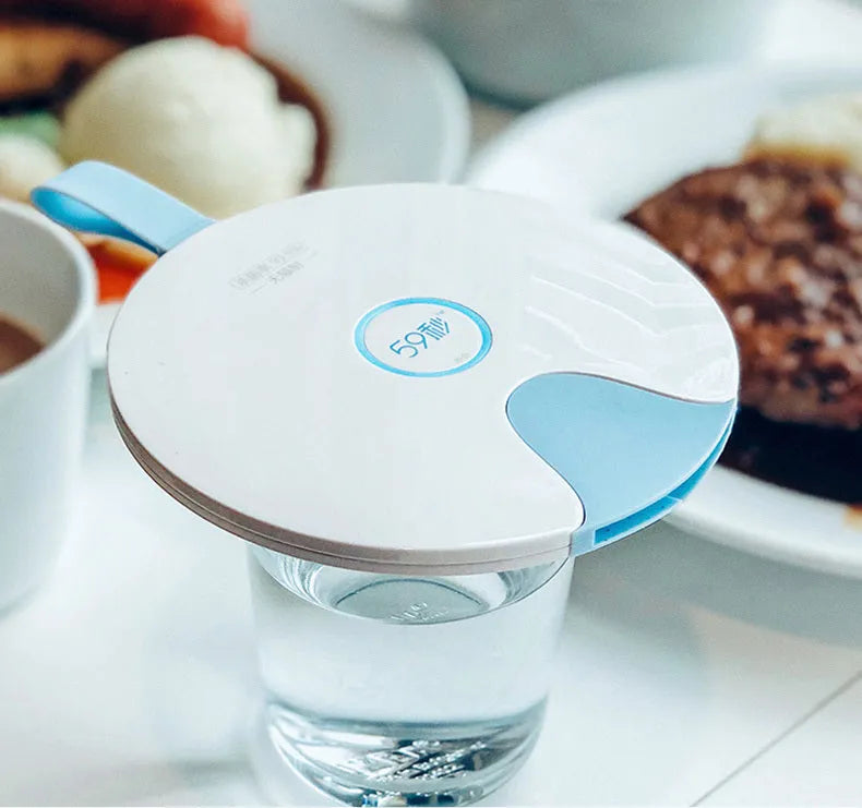 Blue portable baby bottle sterilizer with USB port showing compact 163.6mm design