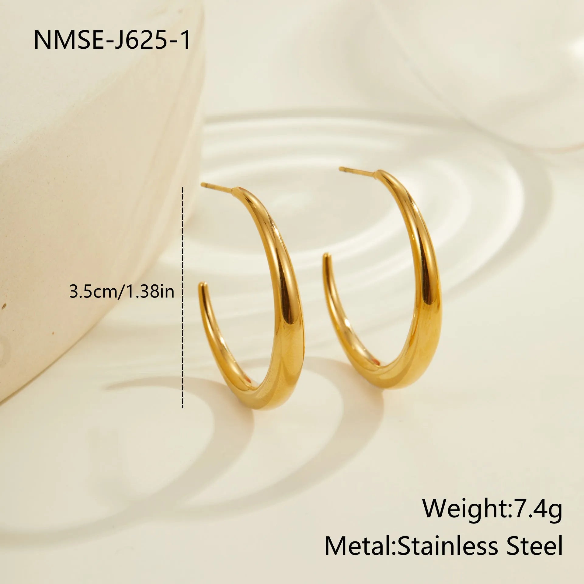 Women's stainless steel hoop earrings with 18K PVD gold plating in geometric round design
