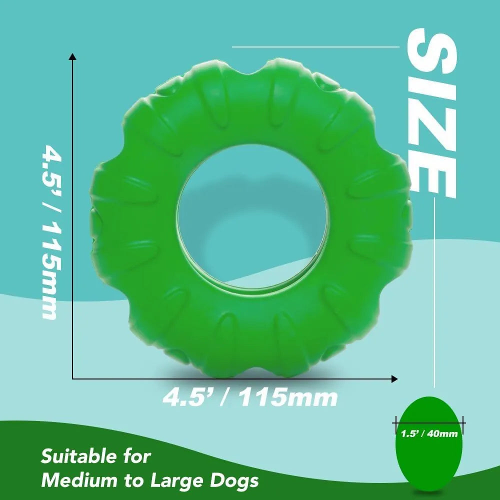 Blue rubber tire-shaped dog chew toy with oval openings for treat dispensing on a white background.