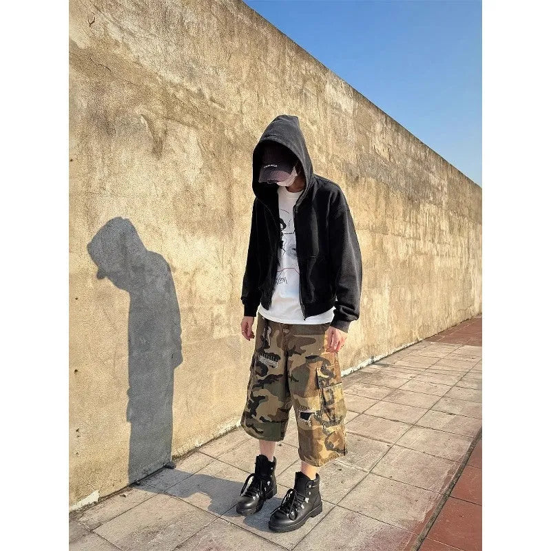 Men's camouflage jeans with patch and ripped detailing in straight-leg cropped style