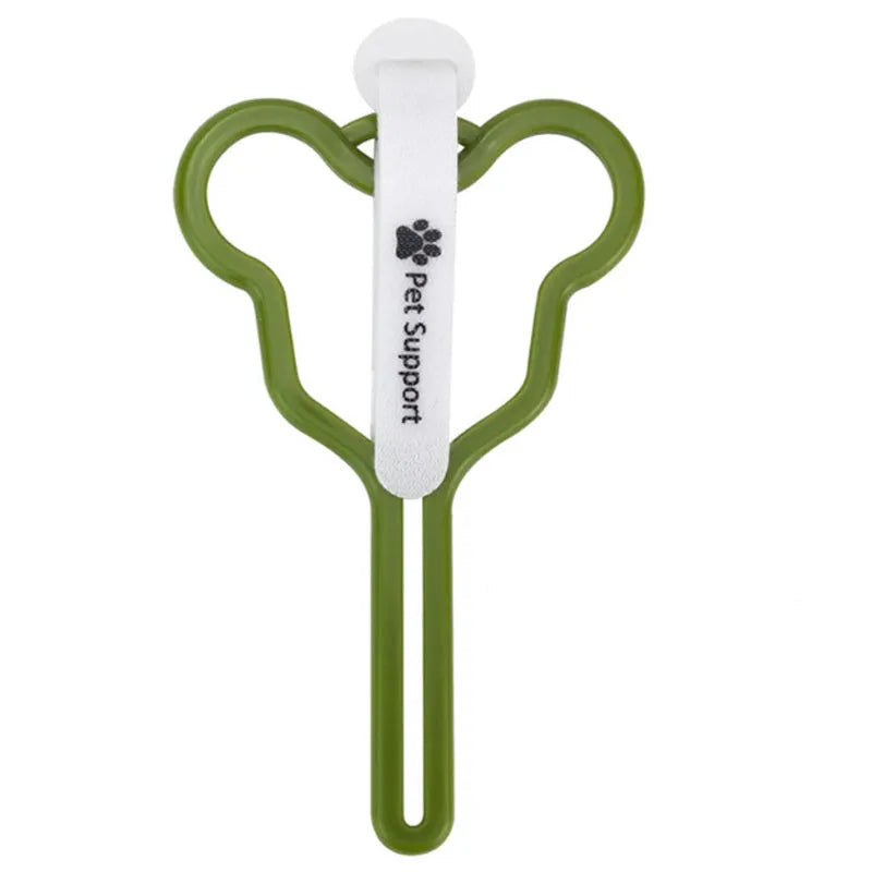 A dog poop bag holder with a fixed clip and adjustable Velcro strap, shown in a random colour.