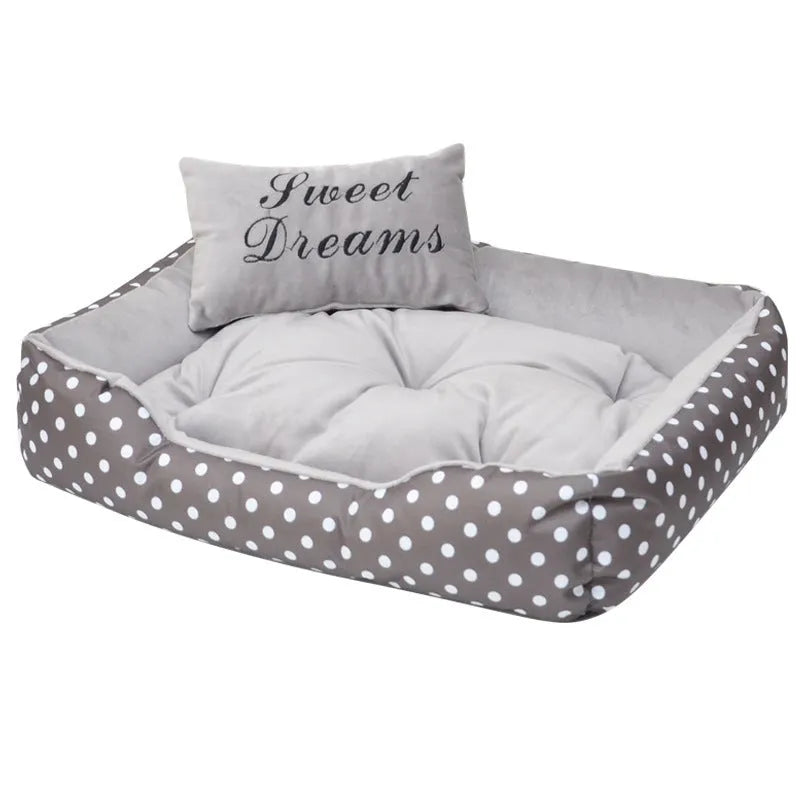 Small polka dot print dog bed with a square cushion, shown in grey colour.
