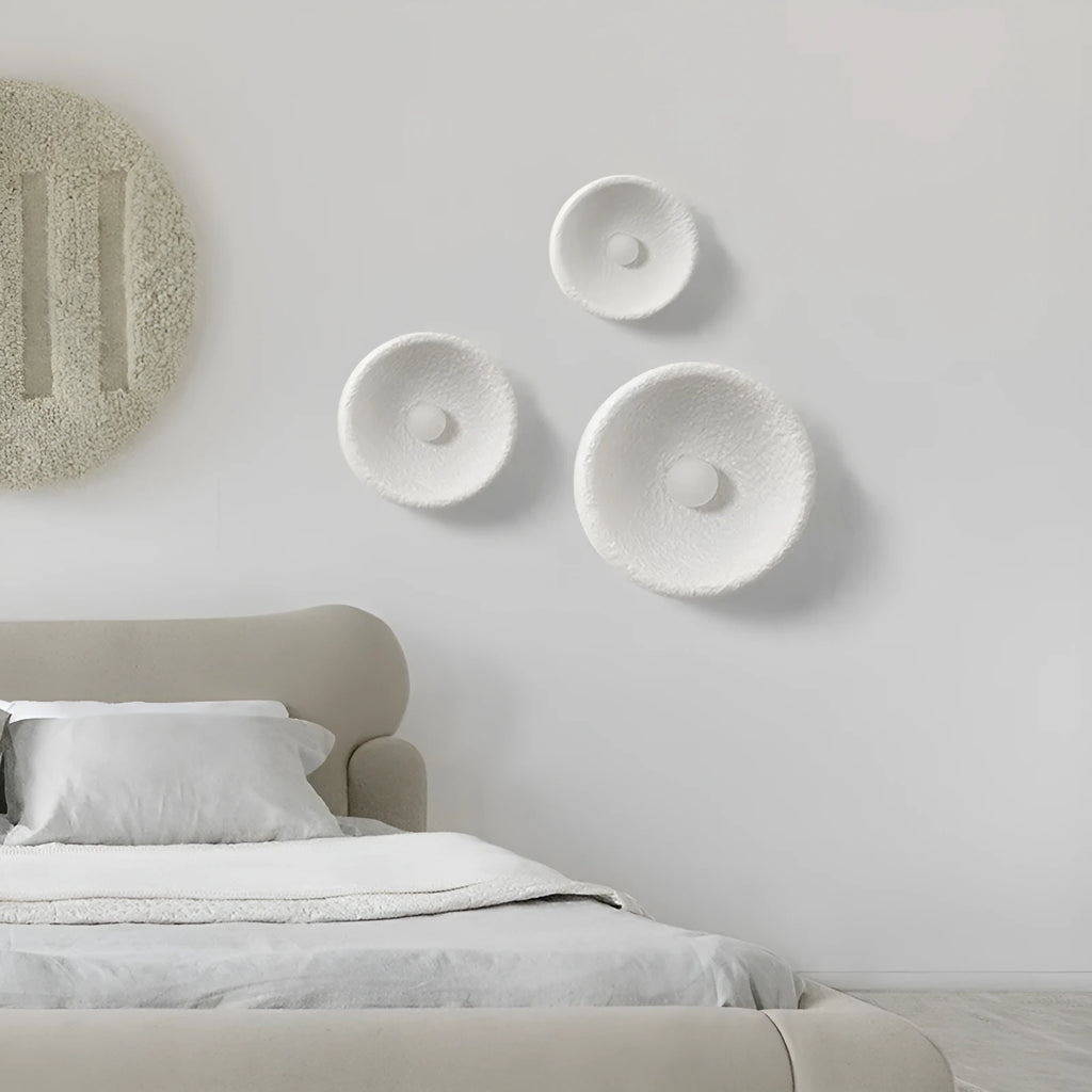 Japanese-style simple modern wall lamp with round resin shade in warm light
