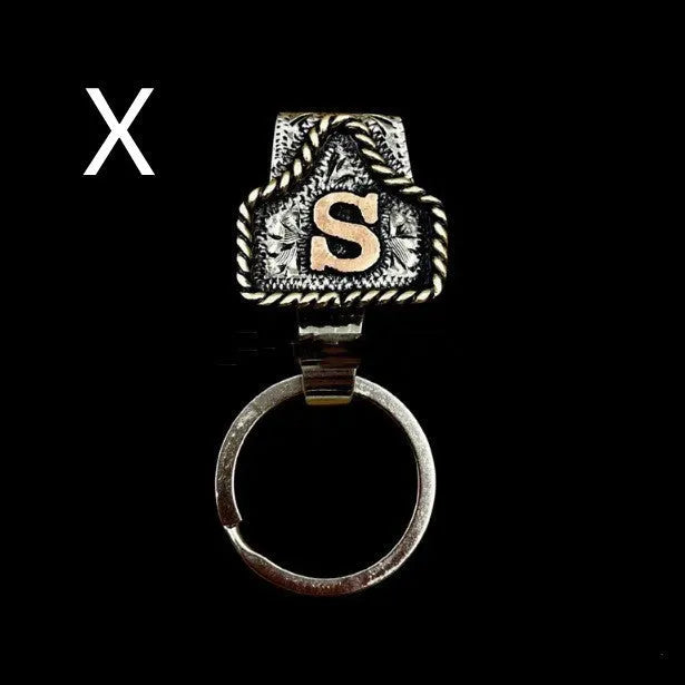 Handmade stainless steel cow tag belt key holder with engraved number plate on a split ring.