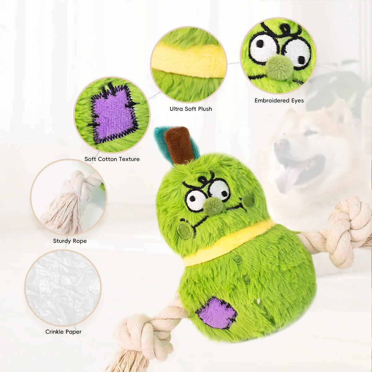 Green and purple interactive dog toy with cotton rope knots and a soft plush centre.