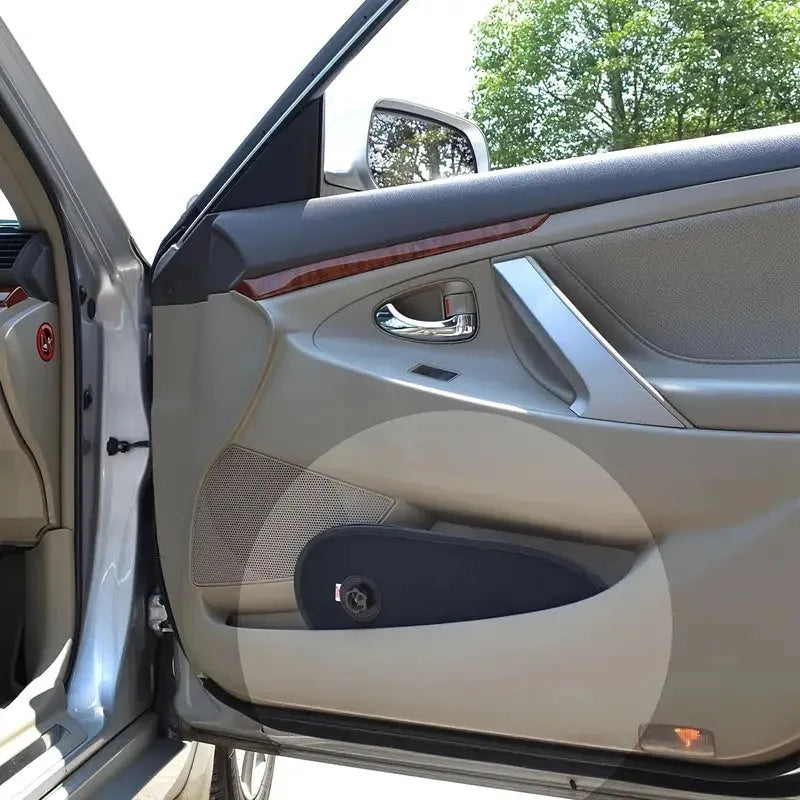 Black breathable car window shade with suction cups attached to vehicle side window