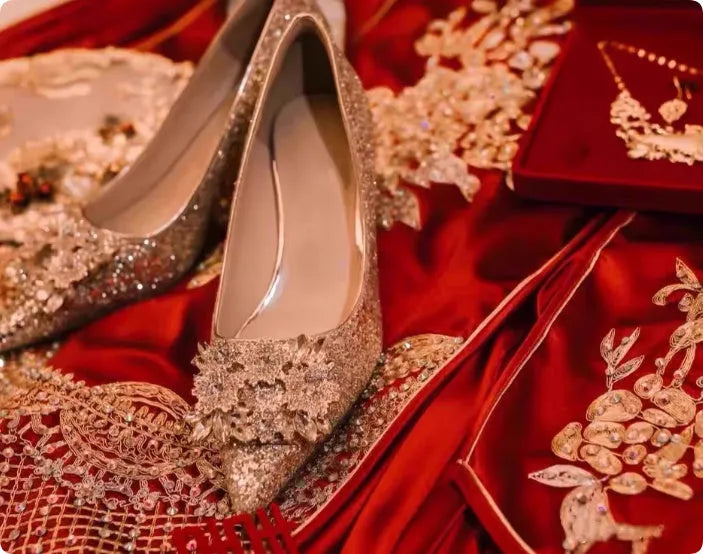 Champagne coloured pointed toe bridal heels with rhinestone patterns on a fine heel.