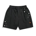 Men's black semi-elastic shorts with straight-leg loose fit and zip fly closure