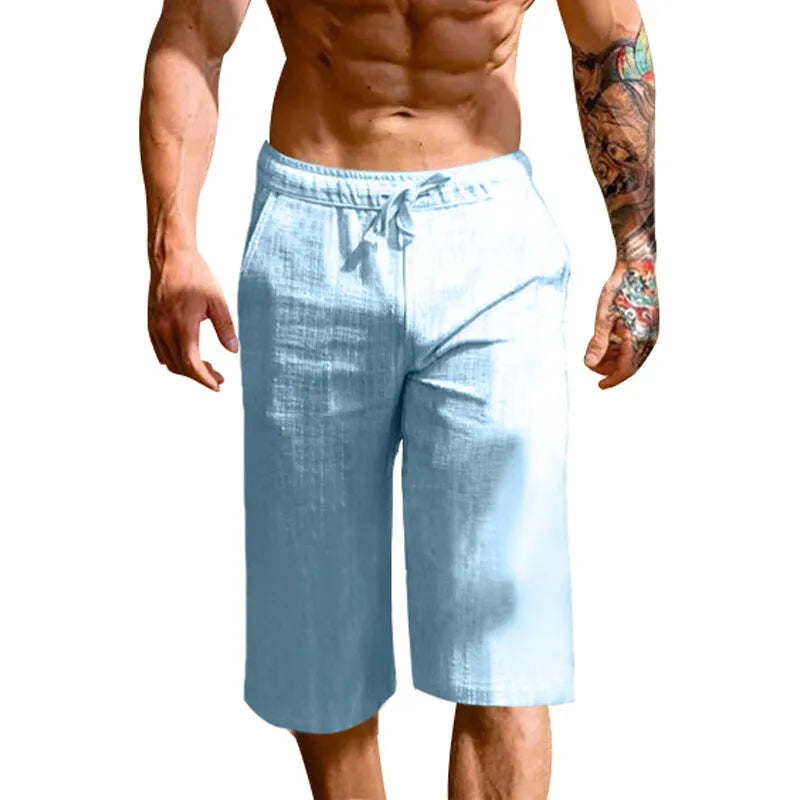 Men's loose linen blend cropped pants in khaki, shown on model, mid-waist straight leg